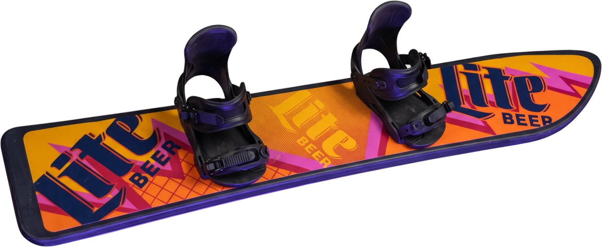 Vintage orange Lite Beer snowboard with black bindings, inspired by the one hanging at RJ’s Pub